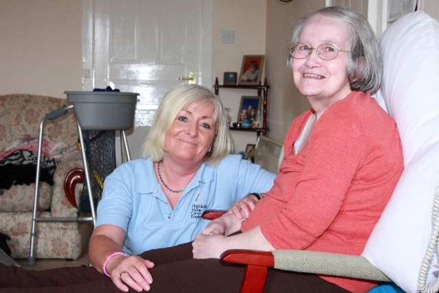 Highland Home Carers member of staff with customer